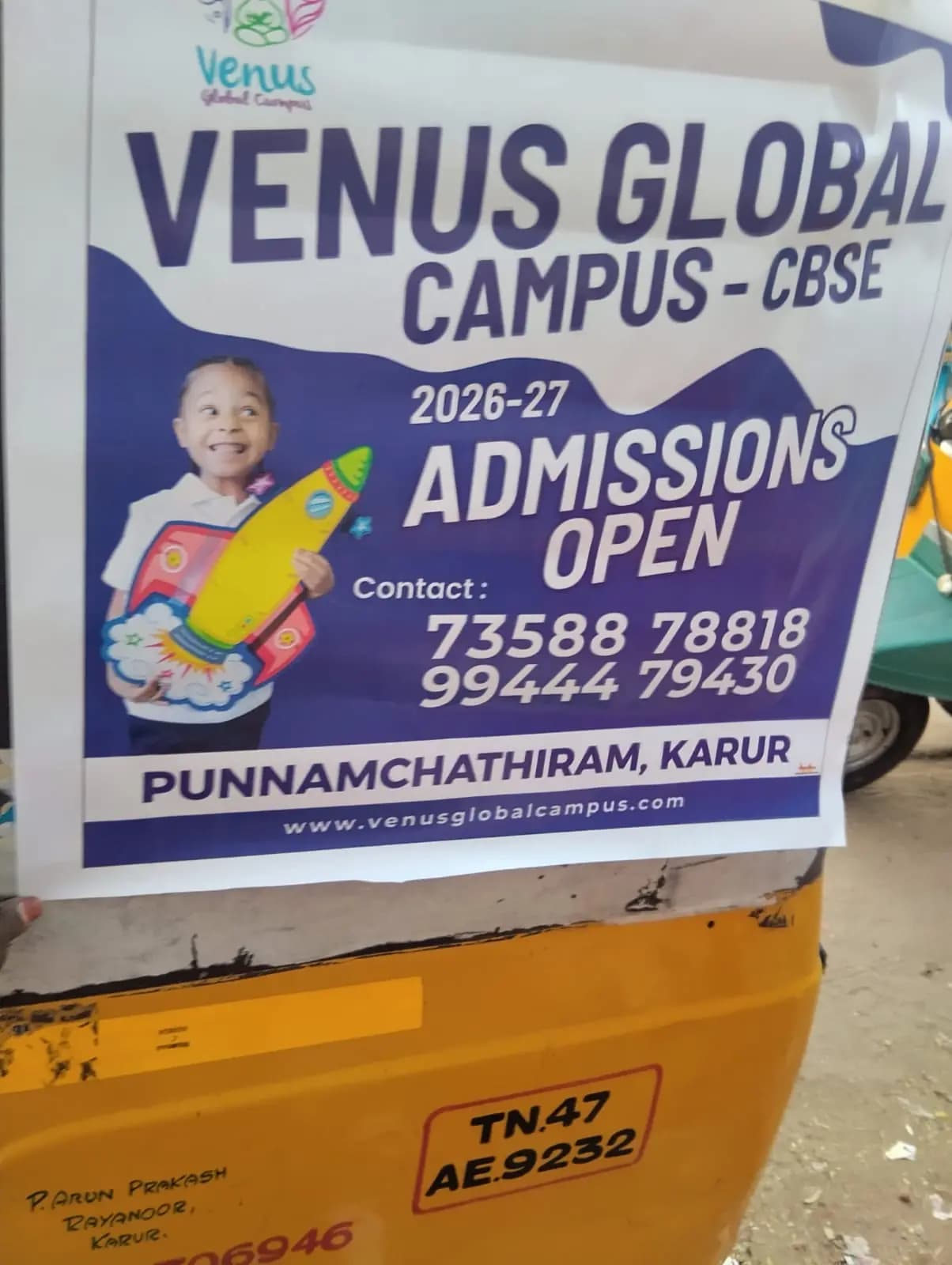 Venus Global Campus admissions ad on auto-rickshaw back panel