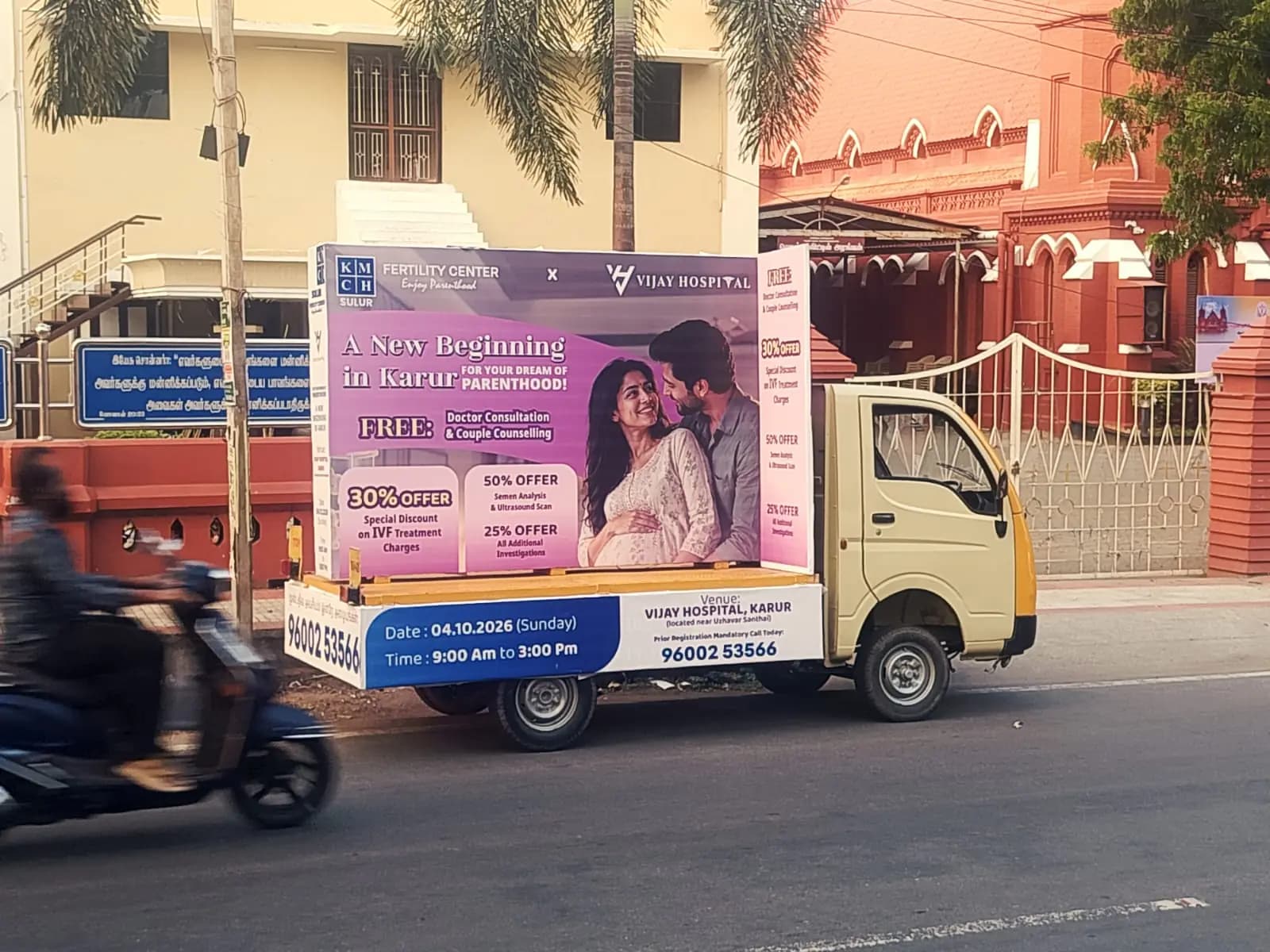 Mobile ad van with fertility clinic panel on street