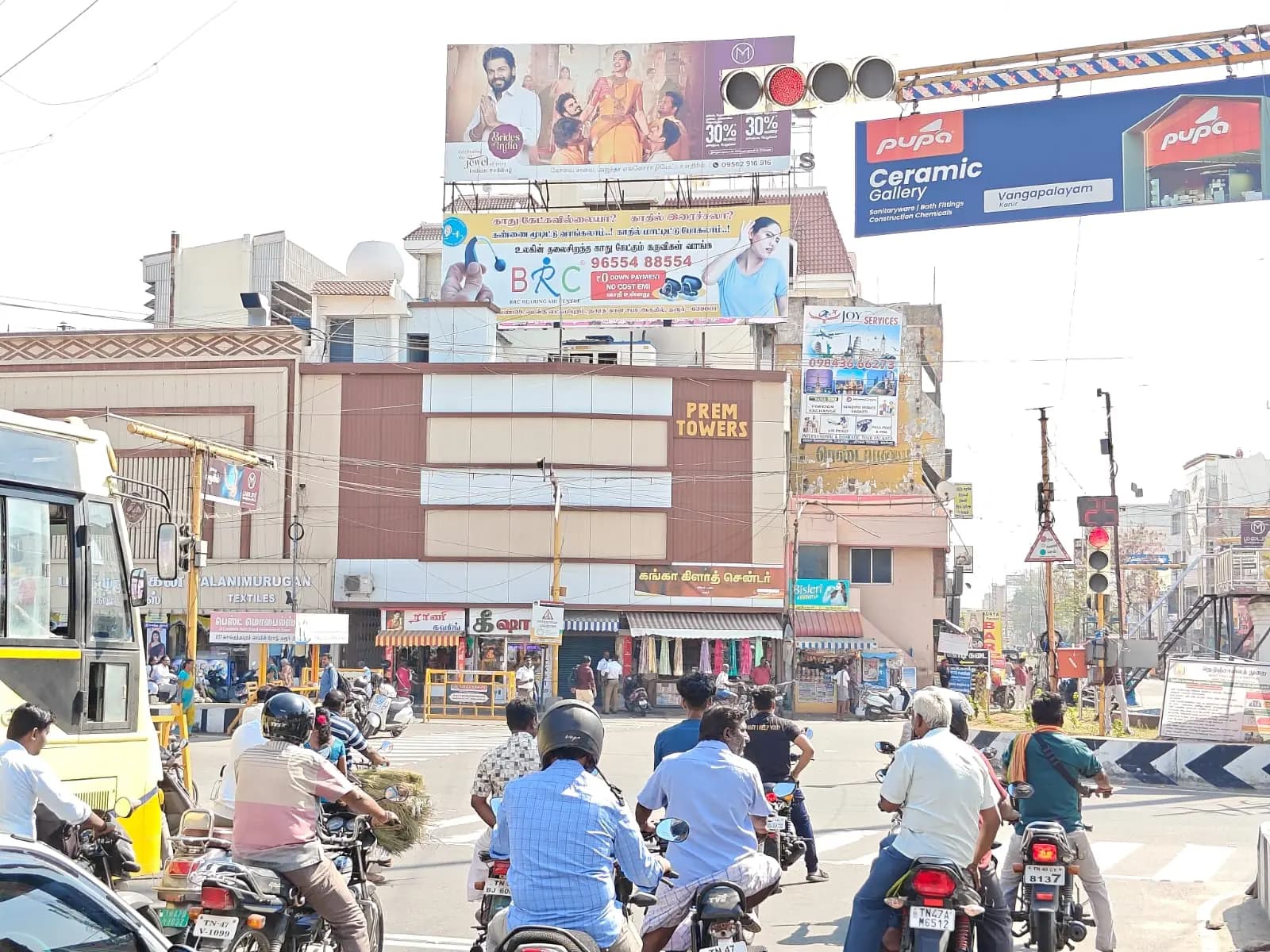 Rooftop hoardings above busy traffic junction