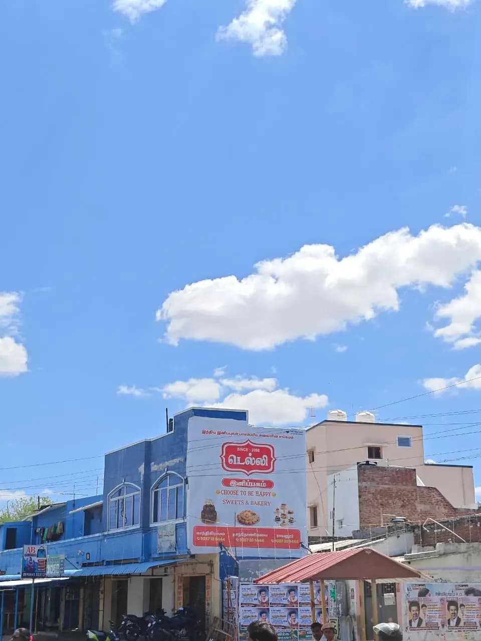 Rooftop hoarding for sweets & bakery on corner building