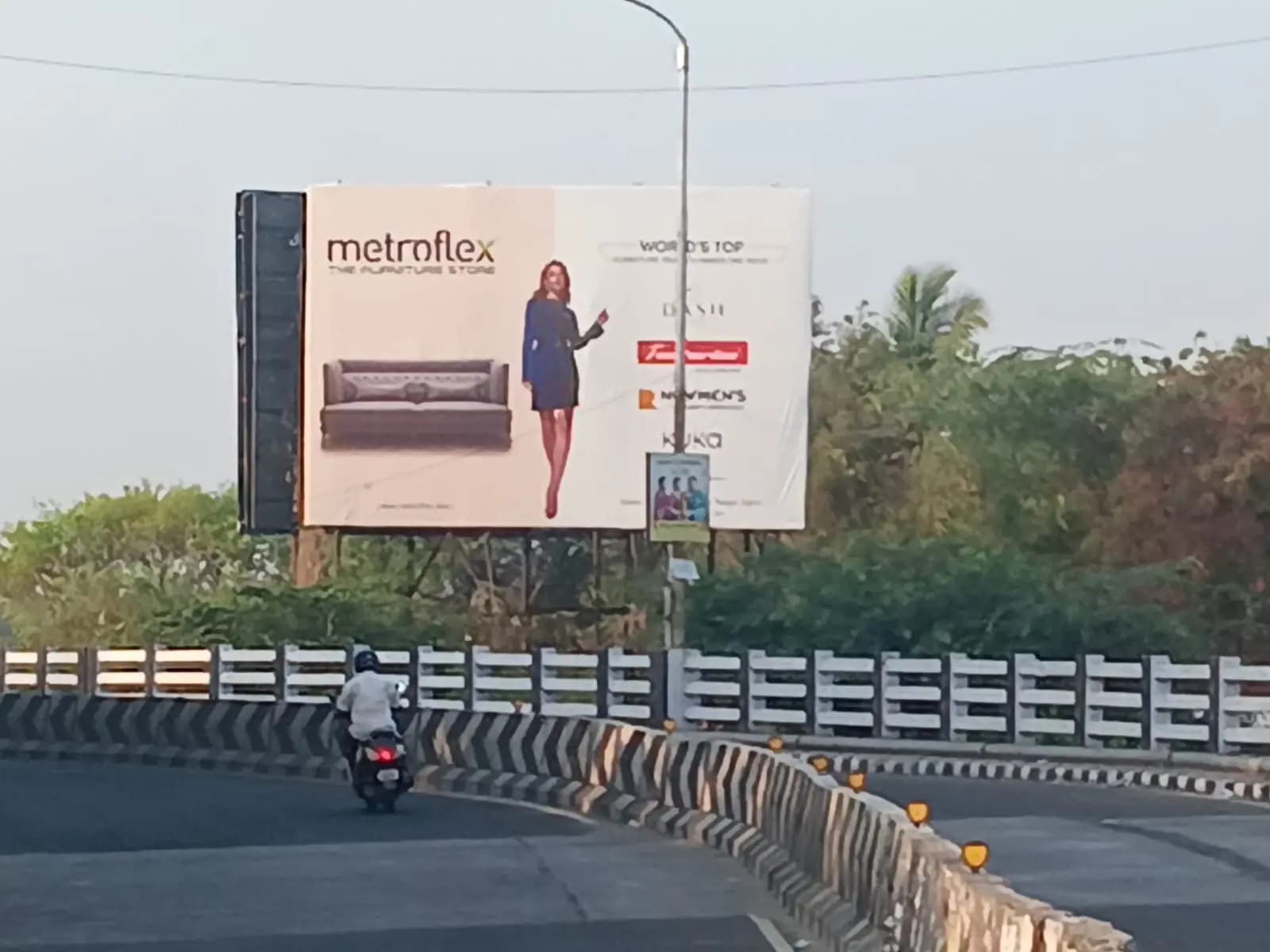 Metroflex mattress/sofa hoarding near flyover curve