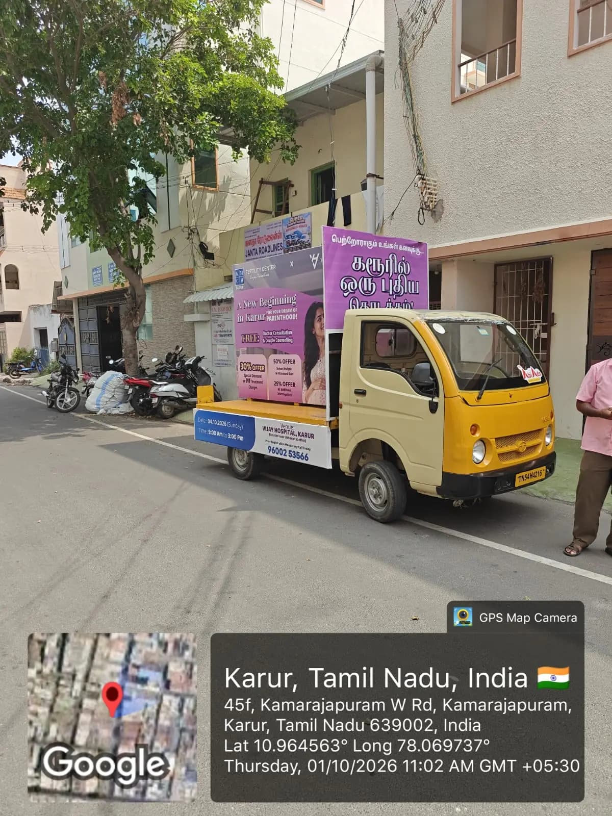 Ad van with hoarding panels parked on street
