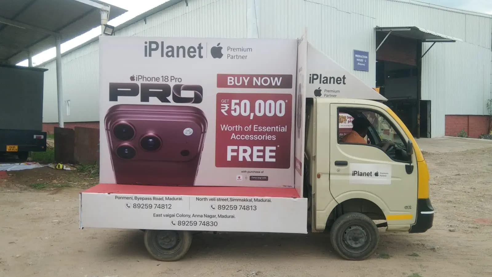 IPlanet iPhone offer ad on mini-truck van side panel